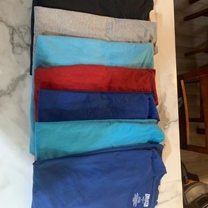 A packaged deal of men’s Duluth Trading Longtail Ts. 8 shirts total.